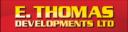 E Thomas Developments logo