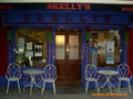 Skellys Bar & Guest House logo