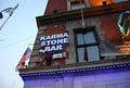 The Karma Stone Bar & Cafe logo