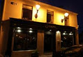 Gilroy's Bar and Áit Eile Restaurant logo