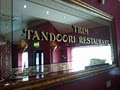 Indian in trim (TRIM TANDOORI) logo